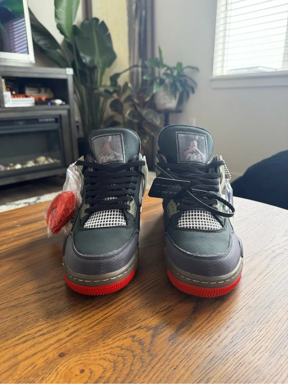 Air Jordan Sneakers. Men's 11 Black/Grey Basketball Sneakers with Red Accents